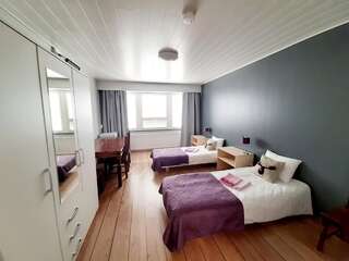 Хостелы Center Hostel Kaatrahovi Лиекса Двухместный номер с 2 отдельными кроватями и общей ванной комнатой-1